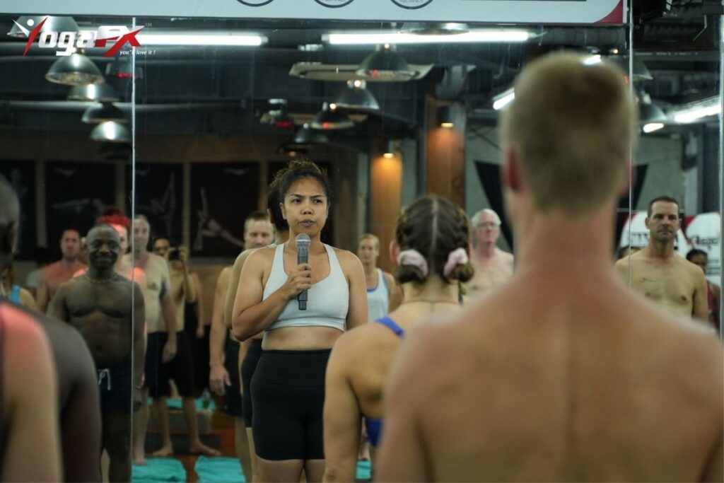 Bikram yoga script versus improvised yoga instruction comparison showing consistency at scale progress measurement and instructor observation advantages