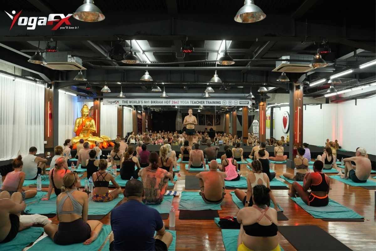 Bikram yoga teacher leading 26 and 2 class at YogaFX Bali showing income potential for certified instructors in 2026