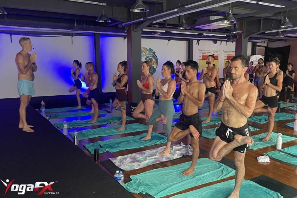 Bikram yoga class in YogaFX Bali natural heat showing how the practice differs from other yoga styles in environment and structure