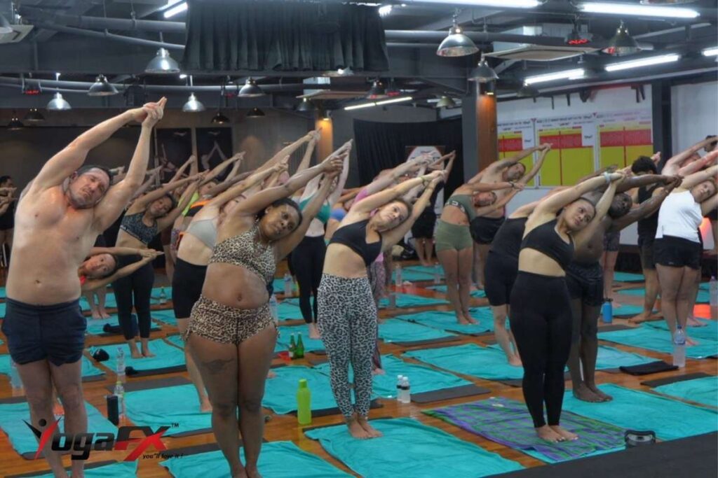 YogaFX Bali wellness retreat studio showing hot yoga class in natural tropical heat with no electric heaters Seminyak Canggu