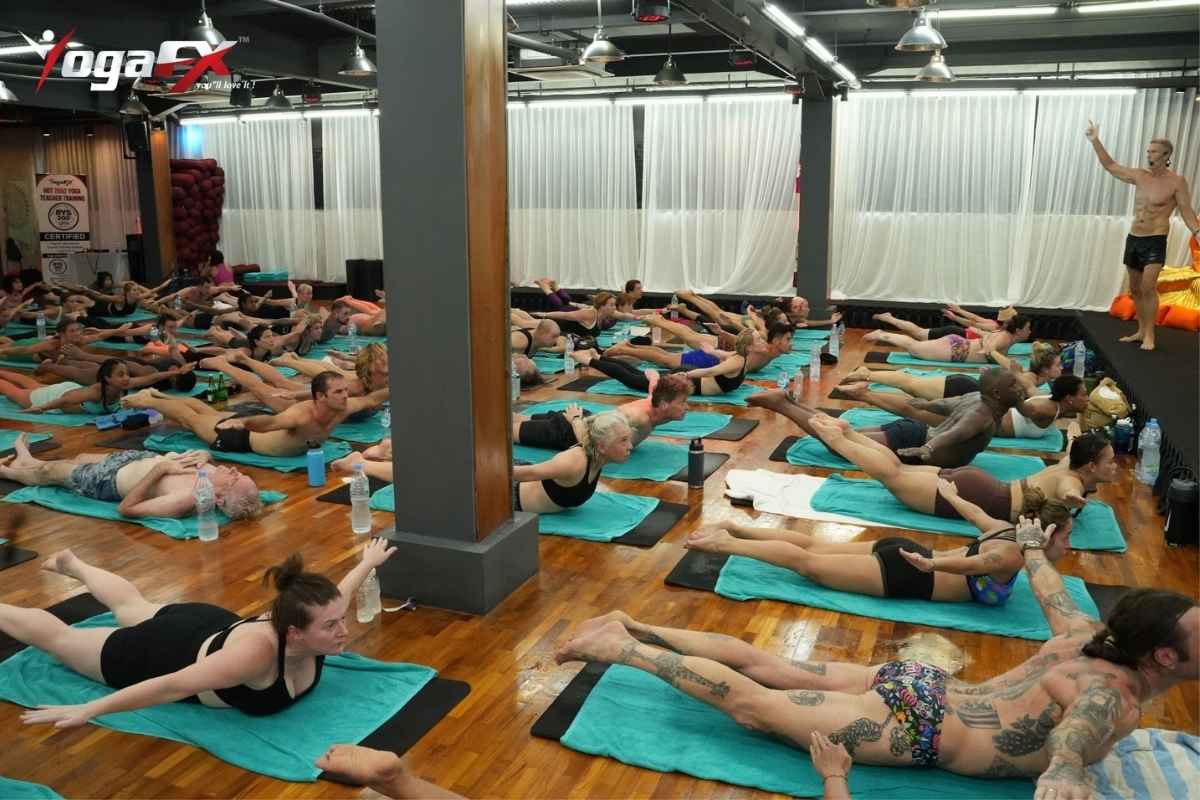 500 hour yoga teacher training pathway showing RYT 200 to RYT 500 to E-RYT 500 credential progression with teaching hours and timeline requirements