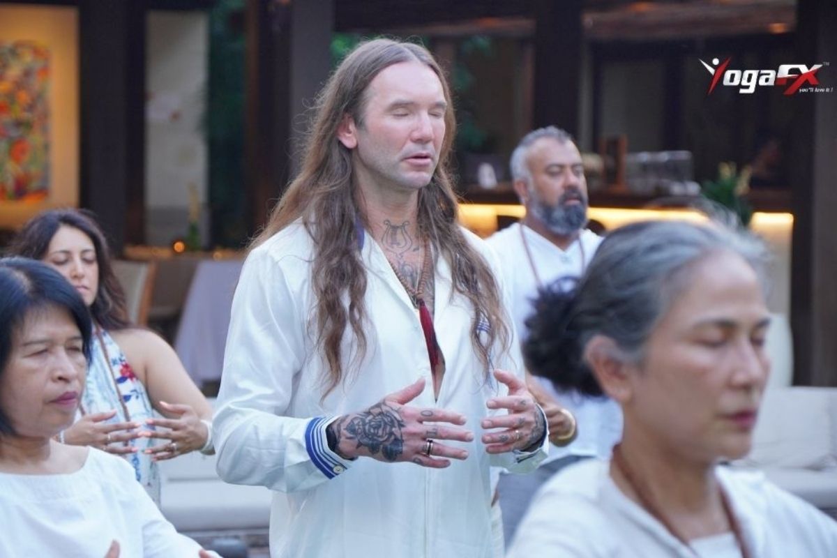 Practitioners in Original Hot 26&2 Yoga standing series during the morning session of the YogaFX Burnout Reset Retreat in North Bali