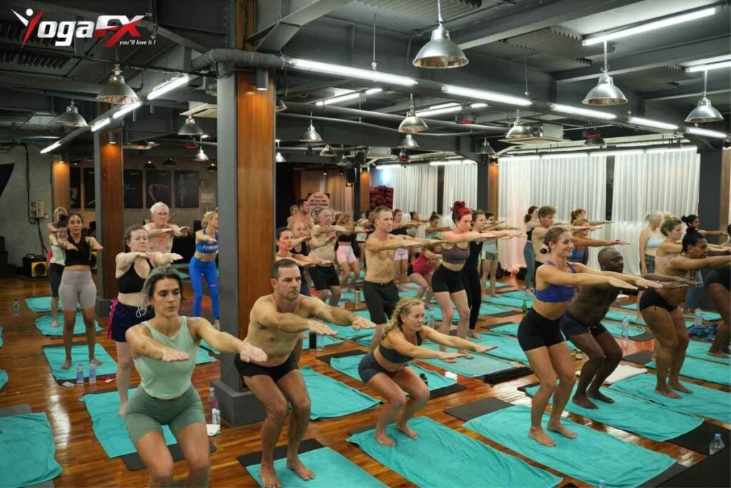 Bikram yoga teacher credential pathway showing YogaFX RYT 200 plus Bikram certification plus ACE progression toward E-RYT 500 and teacher training leadership