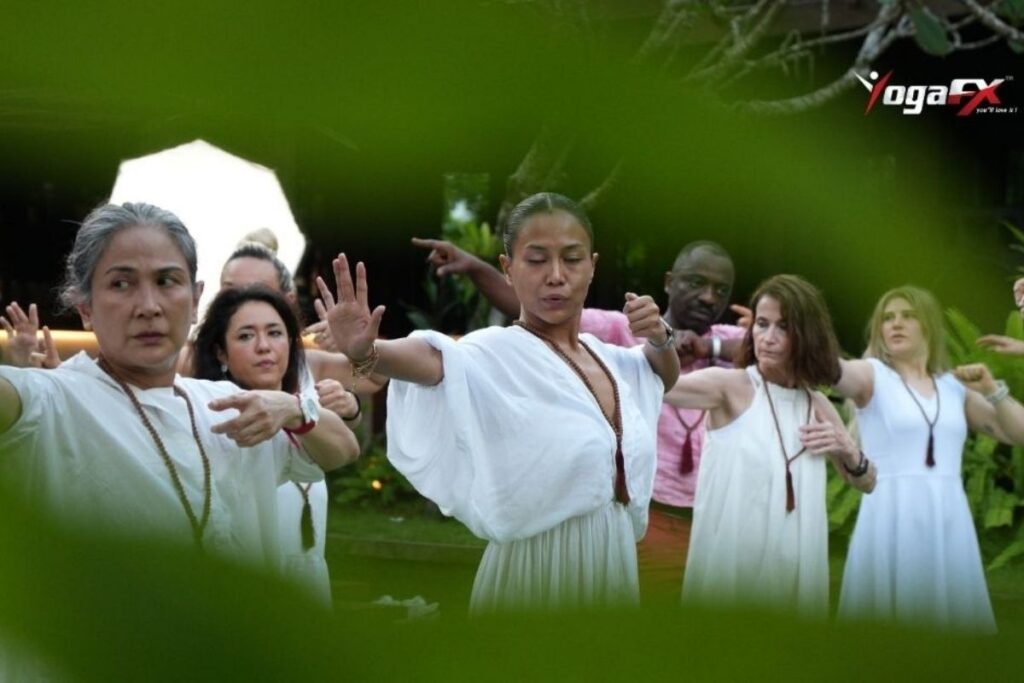 Practitioners in Original Hot 26&2 Yoga standing series during the morning session of the YogaFX Burnout Reset Retreat in North Bali