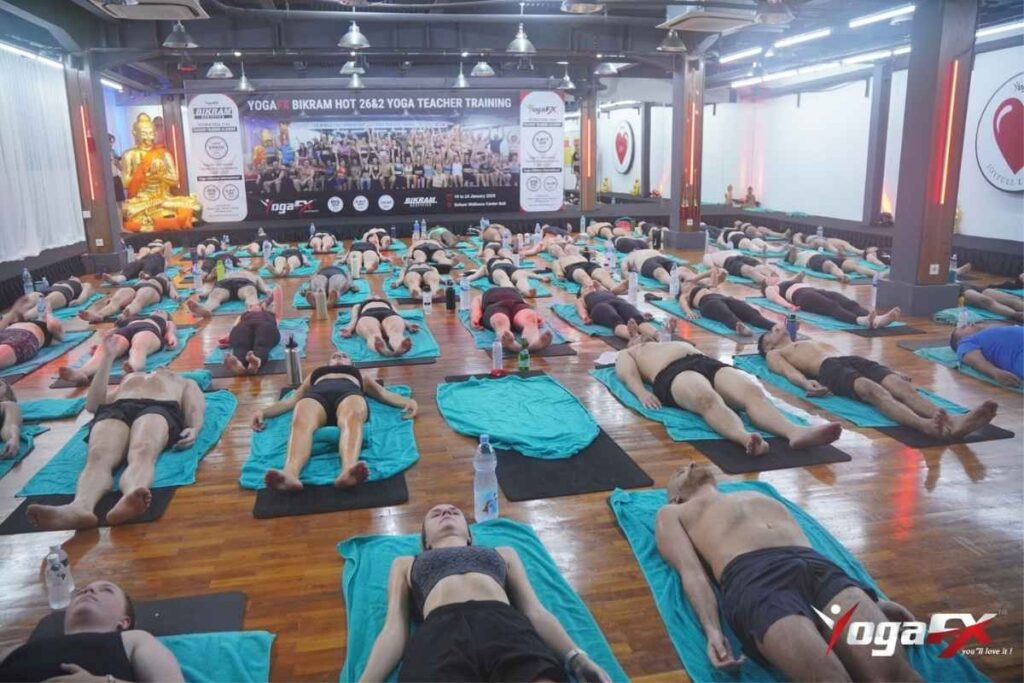 Trainees practicing dialogue clinic during Bikram yoga teacher training in Seminyak, Bali
