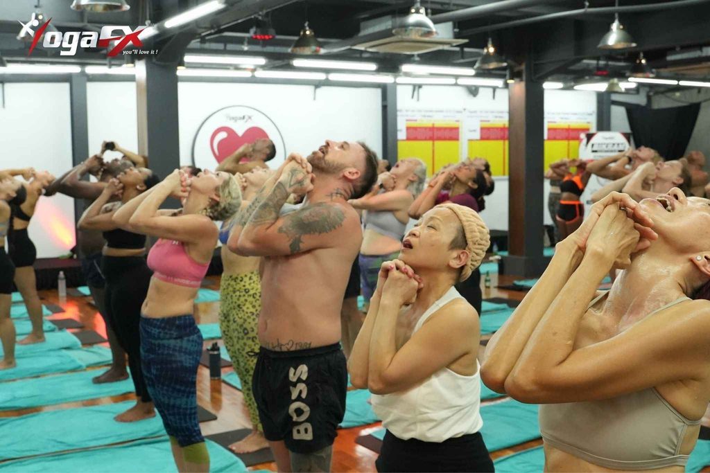 Bikram yoga teacher training cost comparison: nine-week residential program in Thailand versus the 6-day YogaFX hybrid intensive in Bali